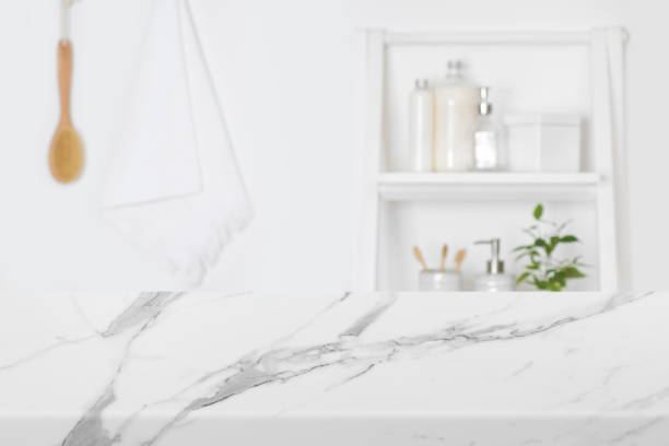 istock Marble texture tabletop for product display and blur bathroom wall 1322859427