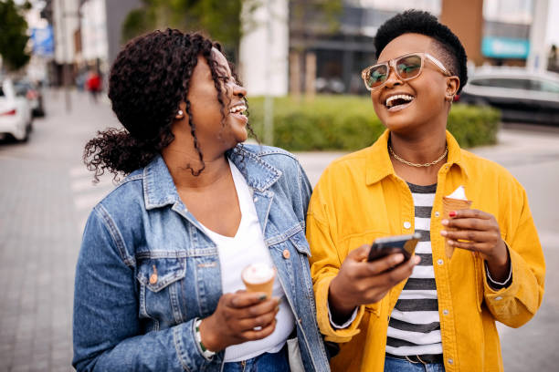 istock Friends enjoying ice cream in summer time 1322859479