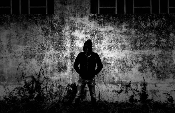 istock Young street gang with mask 1322863129