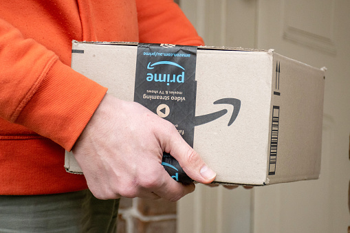 Sydney, Australia - 2020-05-24 Amazon prime boxdelivered to a front door of residential building.