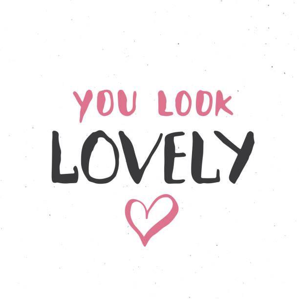 istock You look lovely lettering handwritten sign, Hand drawn grunge calligraphic text. Vector illustration 1322866098