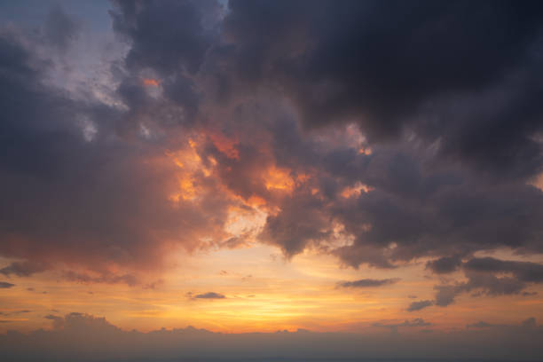 istock Colourful and dramatic cloud sky at sunset after a thunderstorm 1322871284