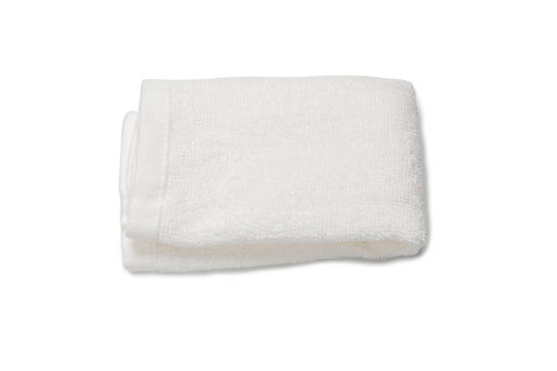 istock White fluffy cotton towel isolated on a white background. 1322871622