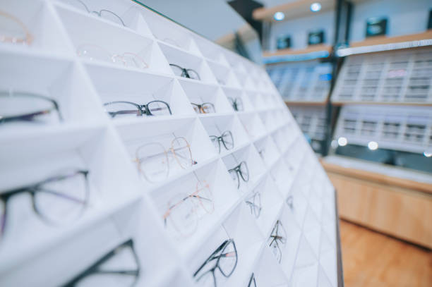 istock optical shop with variety of eyeglasses frame displayed on shelf 1322879480