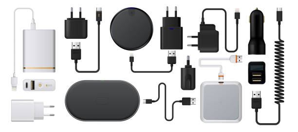 Charge smartphone. Realistic wireless charger. 3D energy battery refuels. Plug socket with USB cords. Auto charging adaptor. Isolated devices for mobile. Vector digital accessories set Charge smartphone. Realistic wireless charger. Isolated 3D energy battery refuels. Plug socket with USB power cords. Auto charging adaptor. Isolated devices for mobile. Vector digital accessories set battery charger stock illustrations