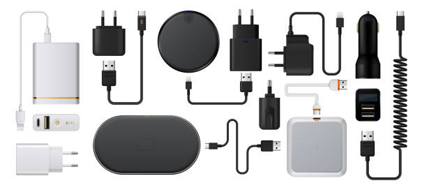 Charge smartphone. Realistic wireless charger. 3D energy battery refuels. Plug socket with USB cords. Auto charging adaptor. Isolated devices for mobile. Vector digital accessories set Charge smartphone. Realistic wireless charger. Isolated 3D energy battery refuels. Plug socket with USB power cords. Auto charging adaptor. Isolated devices for mobile. Vector digital accessories set phone charger cable stock illustrations