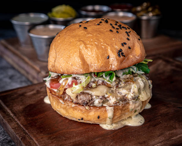 istock Great blue cheese burger served on a slab 1322888720