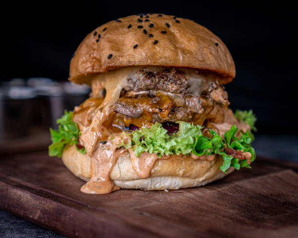 istock Tasty double beef hamburger with artisan bun 1322888757