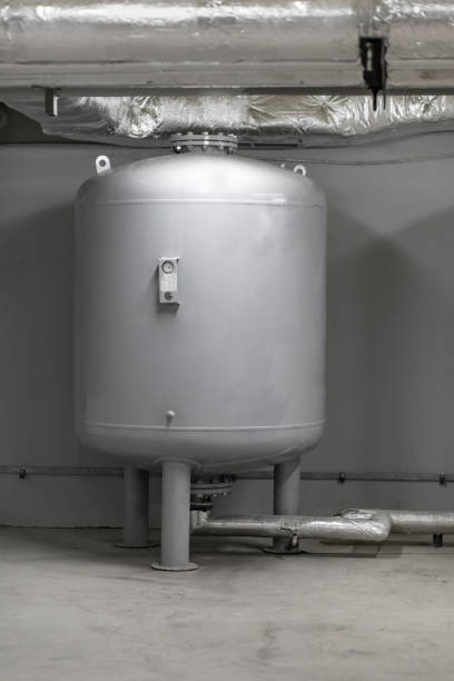 istock Installation of pressure maintenance for heating and cooling systems in building. 1322892757