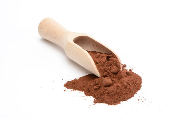 istock Cocoa powder and wooden spoon 1322893925