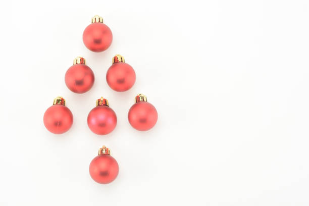 istock Red christmas balls drawing a tree 1322894127