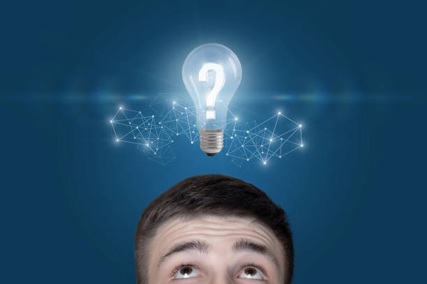 istock Light bulb with a question mark above the man head. 1322894908