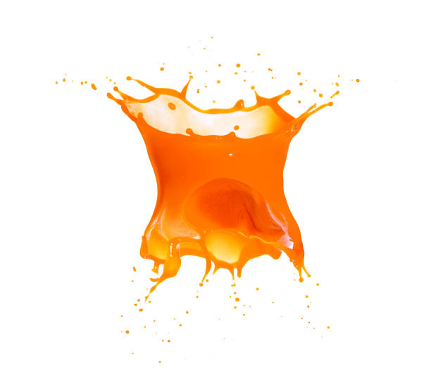 istock Splashes of orange fruit juice, isolated on a white background 1322896342