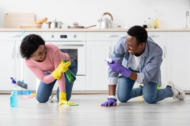 istock Cute black lovers shooting with cleaning sprays 1322896940