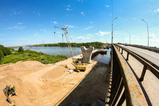 istock Construction of a new bridge over the river. 1322897648