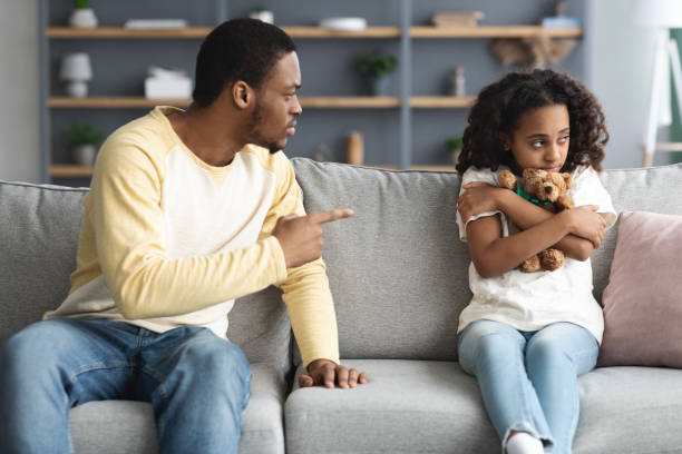 istock Agressive father yelling at his little daughter, home interior 1322898678