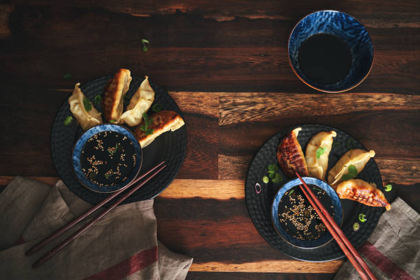 istock Japanese Gyoza Dumplings with Soy Sauce Dip 1322901063