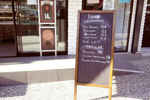 Menu Chalkboard In Front Of A Restaurant, Period of Corona Virus