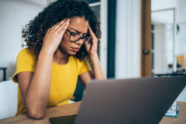 istock Stressed woman using laptop in the office. 1322908253