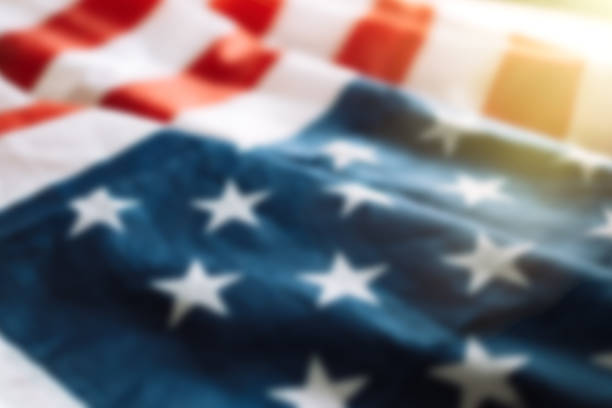 istock Blurred american flag background with sunlight. Fourth july concept 1322910185