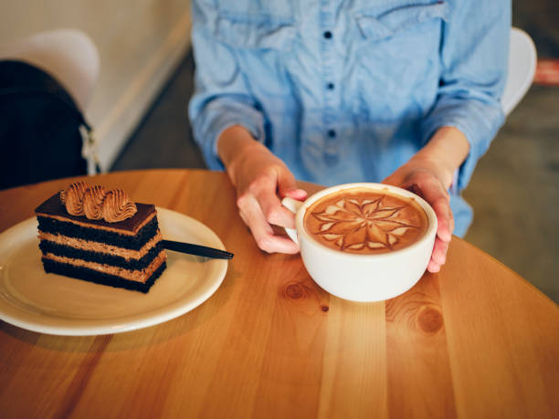 istock Cake and Latte in a Cafe 1322918132
