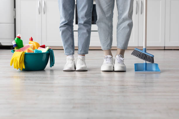 istock Unrecognizable man and woman cleaning kitchen together 1322918228