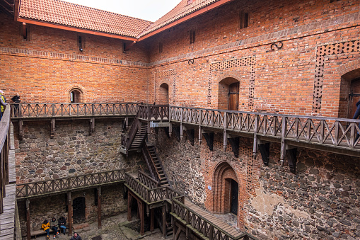 Trakai, Lithuania - February 16, 2020: Reconstructed Trakai Island Castle courtyard built of stone and bricks. Trakai Castle is one of the most popular tourist destinations in Lithuania