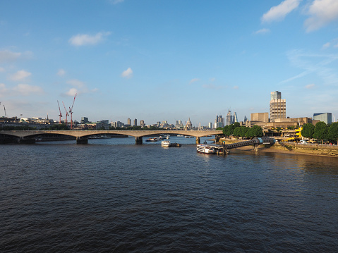 London, Uk - Circa June 2018: Waterloo bridge and river Thames view at sunset, with the city skyscrapers in the background
