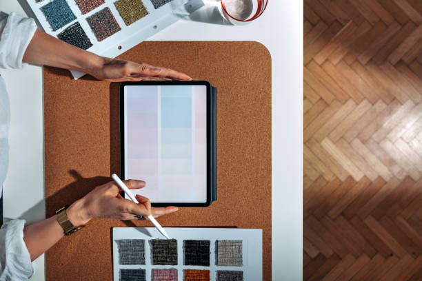 istock Young Woman Choosing Colour Palette Using Tablet 1322927690