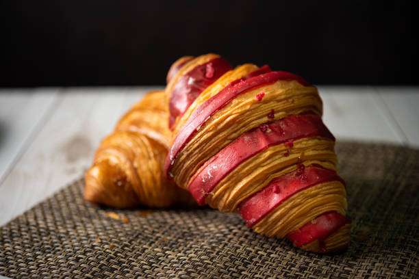 Croissant bakery on white wooden table