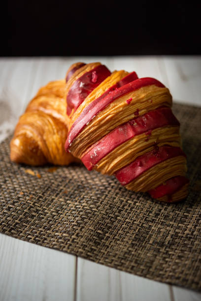 Croissant bakery on white wooden table
