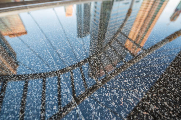 istock Reflection Modern structure bridge shape and building on water in train station, Bangkok, Thailand. 1322948590