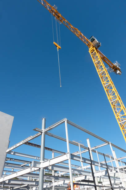 Structural steel and crane on multistory constructions site Structural steel draming  and crane constructions site, Taurranga New Zealand. structural steel stock pictures, royalty-free photos & images