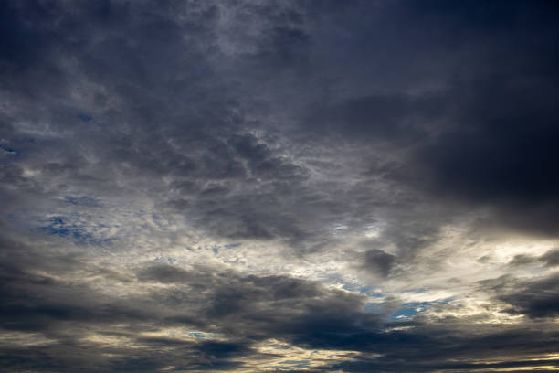 istock Colorful dramatic sky with cloud at sunset.Sky with sun background 1322959203