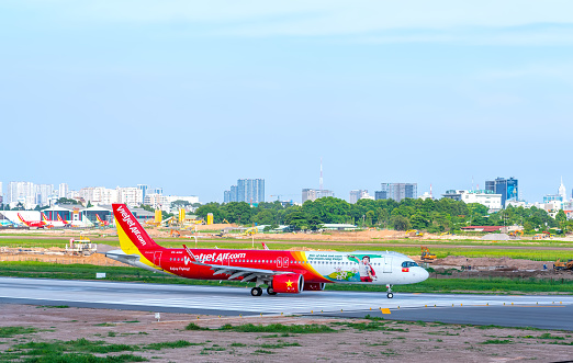 Ho Chi Minh City, Vietnam - May 20th, 2021: Cargo plane Airbus A321 of VietJet Air landing at Tan Son Nhat International Airport, Ho Chi Minh City, Vietnam