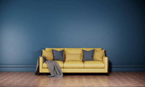 istock yellow sofa in blue color room. interior design modern retro style 3d rendering background 1322961446