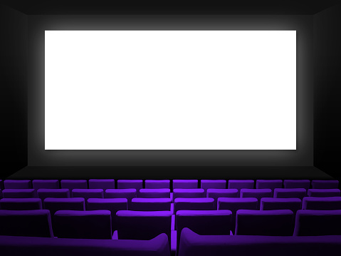 Cinema movie theatre with purple velvet seats and a blank white screen. Copy space background