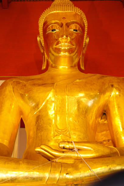 Golden buddha statue inside Wat Phanan Choeng Temple Golden buddha statue inside Wat Phanan Choeng Temple in Ayutthaya, Thailand wat phananchoeng stock pictures, royalty-free photos & images