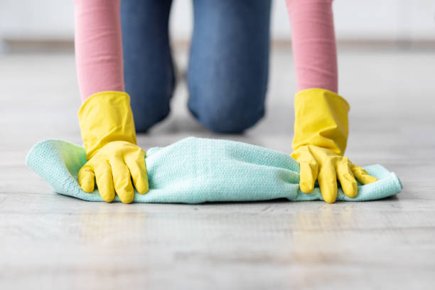 istock Unrecognizable lady cleaning floor, wearing rubber gloves 1322973468