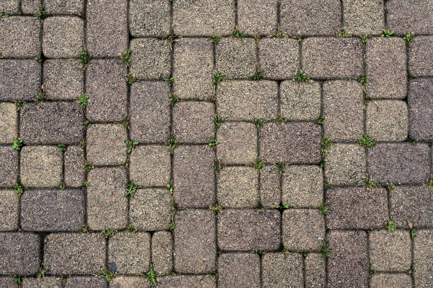 fundo de pedra de pavimentação - paving stone cobblestone road old - fotografias e filmes do acervo