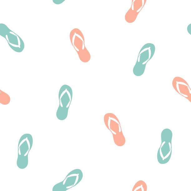 istock Seamless ornament with blue and peach slippers on white background. 1322978320