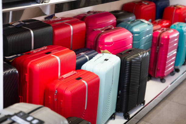 istock Suitcases in dry goods store. Shelving luggage. 1322979301