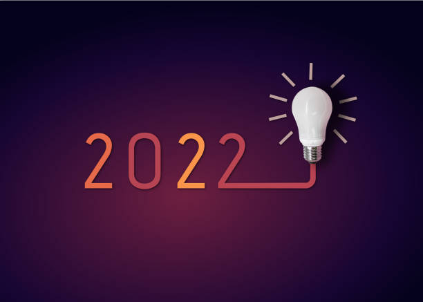 istock happy new year 2022. year 2022 with light bulb. 1322980312