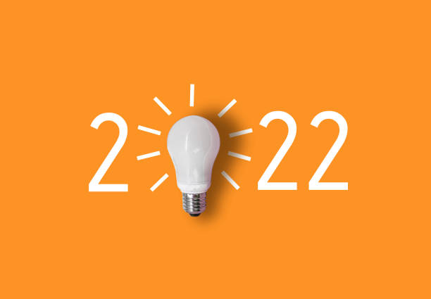 istock happy new year 2022. year 2022 with light bulb. 1322980319