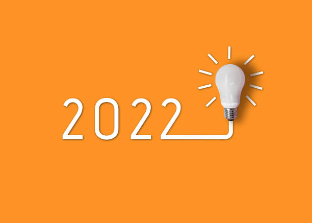 istock happy new year 2022. year 2022 with light bulb. 1322980327