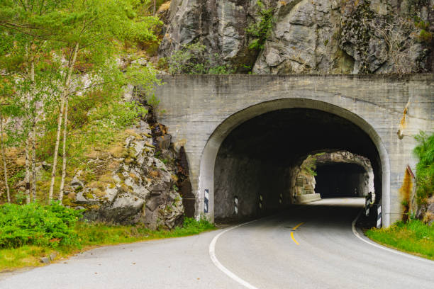 istock Road with tunnel in mountains Norway 1322982374