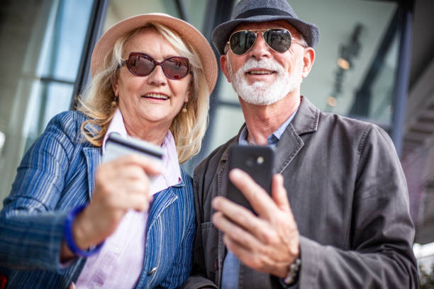 istock Smiling happy elderly couple who went shopping. 1322982468
