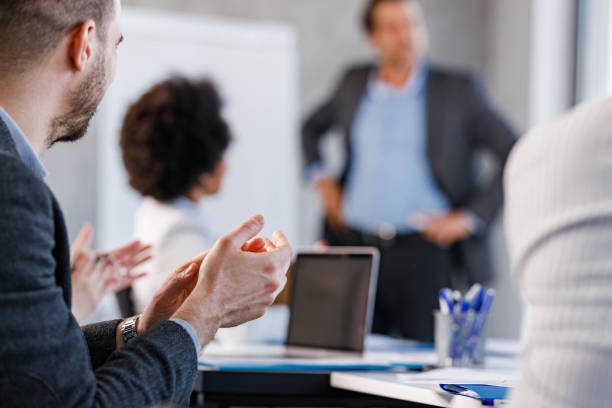 istock Applauding on successful business presentation in the office! 1322982526