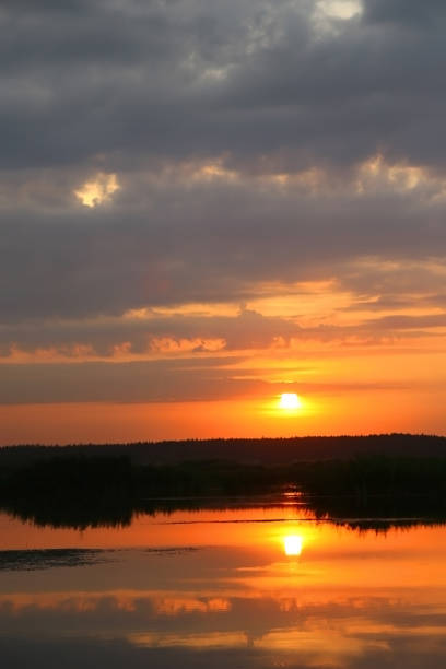 istock Red sunset over the lake. 1322983369