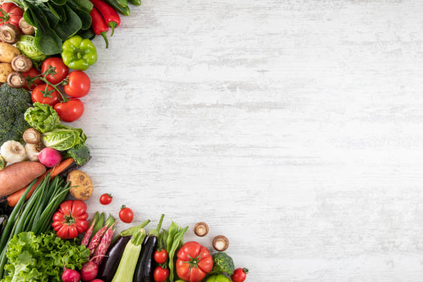 istock Fresh Vegetables on White Wooden Table 1322984528